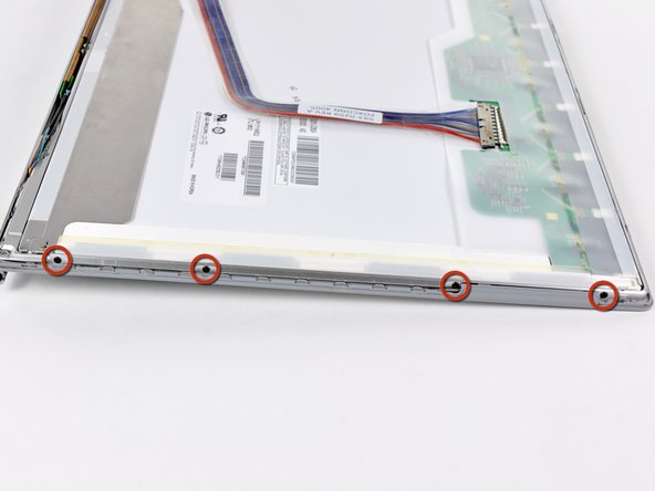 PowerBook G4 Aluminum 17" 1.67 GHz (High-Res) Front Display Bezel Replacement: step 50, image 1 of 1