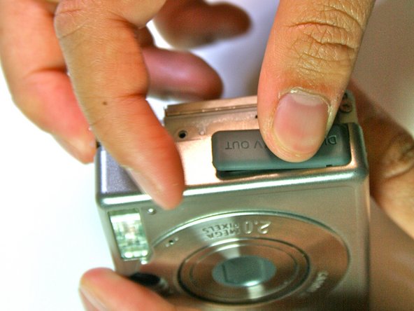 Canon Powershot S200 Screen Replacement: step 11, image 1 of 2