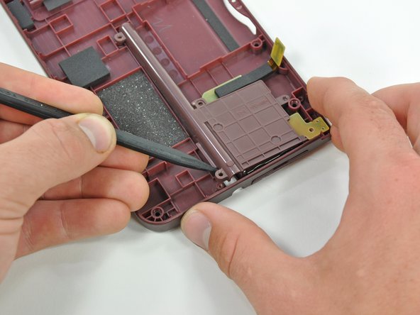 Nintendo DSi XL Stylus Housing Replacement: step 10, image 2 of 3