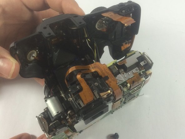 Disassembling Canon EOS Rebel XS Top Panel: step 9, image 1 of 1