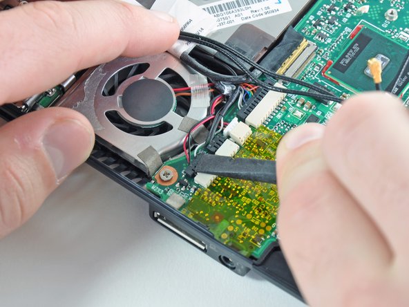 HP Mini 1000 Left Display Hinge Replacement: step 29, image 2 of 2