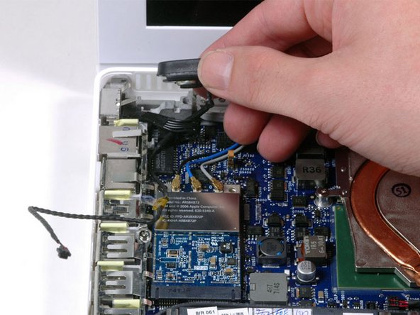 MacBook Core 2 Duo Left Speaker Replacement: step 16, image 1 of 1