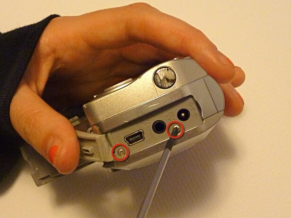 Olympus D590 Retainer Clip Replacement: step 5, image 1 of 1