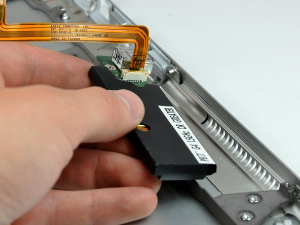 PowerBook G4 Aluminum 17" 1.67 GHz (High-Res) Lower Case Replacement: step 69, image 2 of 2