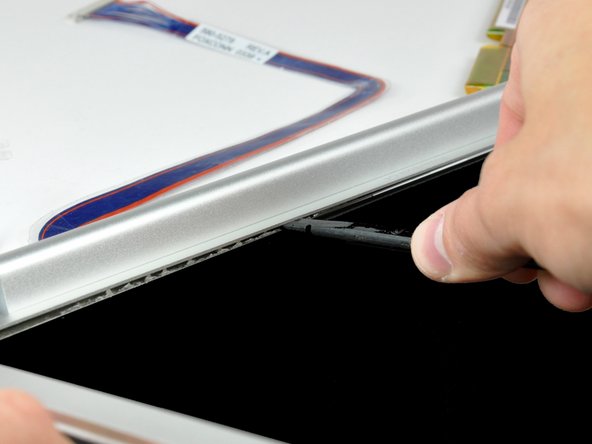 PowerBook G4 Aluminum 15" 1.5-1.67 GHz Front Display Bezel Replacement: step 53, image 2 of 2