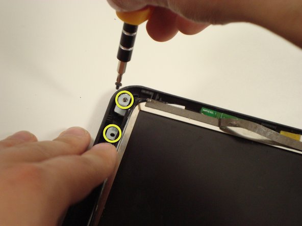 Disassembling Compaq Mini 110 Screen: step 16, image 2 of 3