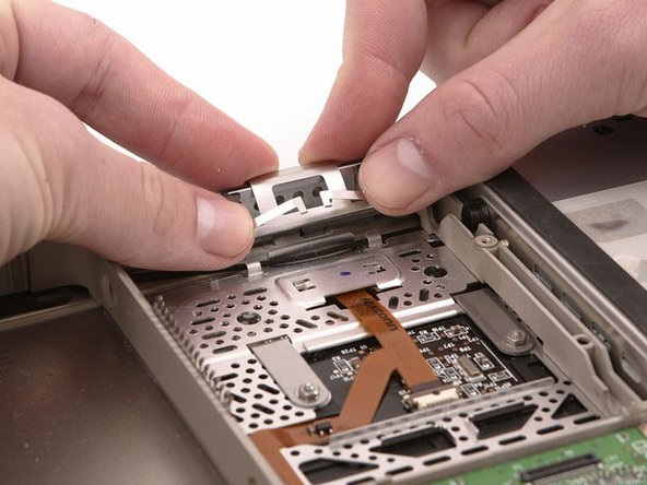 PowerBook G4 Titanium DVI Latch Replacement: step 9, image 1 of 1