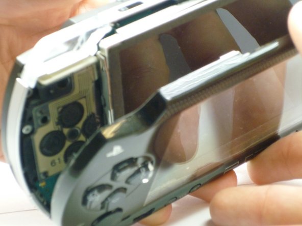 PSP 1000 UMD Door Replacement: step 6, image 1 of 2