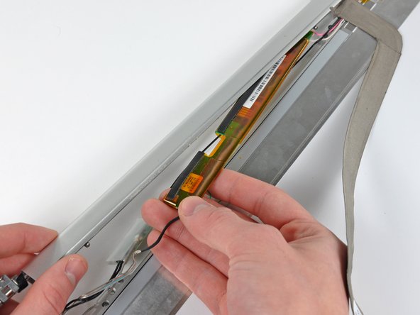 PowerBook G4 Aluminum 17" 1-1.67 GHz Front Display Bezel Replacement: step 31, image 1 of 1