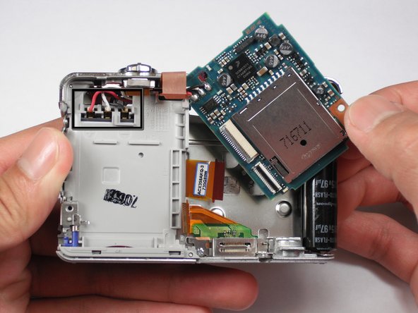 Sony Cyber-shot DSC-W55 Motherboard - First Half Replacement: step 13, image 2 of 2