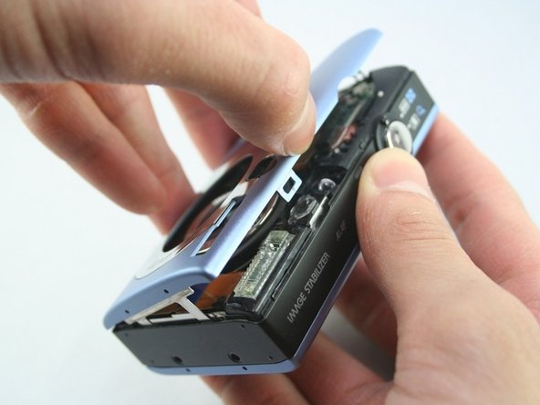 Disassembling Canon PowerShot SD1100 IS AV port and Logic board: step 3, image 1 of 3