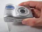 Removing Olympus FE-210 Batteries
