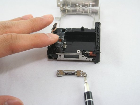 Disassembling Canon PowerShot SD1100 IS AV port and Logic board: step 26, image 2 of 3