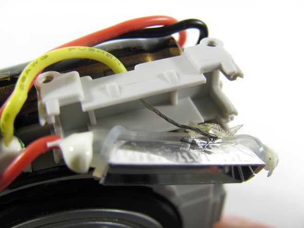 Removing Olympus FE-210 Flash Assembly: step 10, image 2 of 3