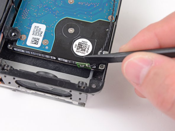 Mac mini Model A1283 Speaker Replacement: step 15, image 1 of 1