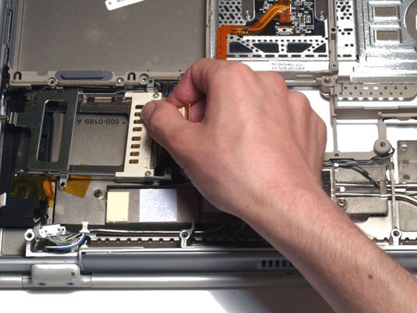 PowerBook G4 Titanium DVI PC Card Cage Replacement: step 31, image 1 of 1