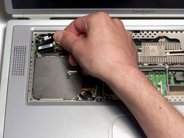 PowerBook G4 Titanium DVI PC Card Cage Replacement: step 25, image 1 of 1