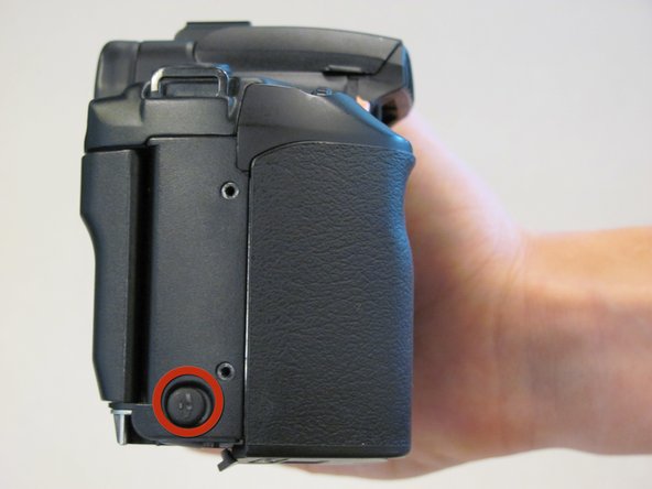 Canon EOS 30 Battery Door Replacement: step 8, image 1 of 1