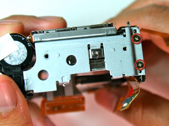 Canon Powershot S200 Camera lens Replacement: step 18, image 1 of 1