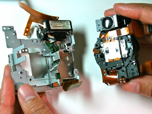 Canon Powershot S200 Camera lens Replacement: step 27, image 2 of 2