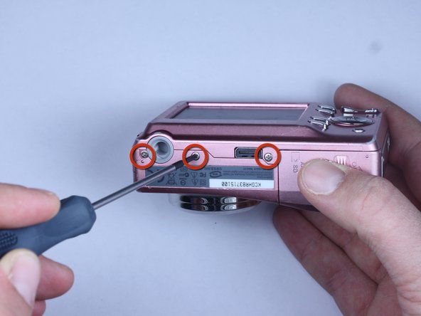 Disassembling Kodak Easyshare C813 Back Cover: step 6, image 1 of 3