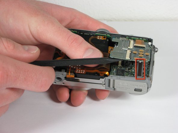 Panasonic Lumix DMC-TZ5 Button Board Replacement: step 9, image 1 of 1