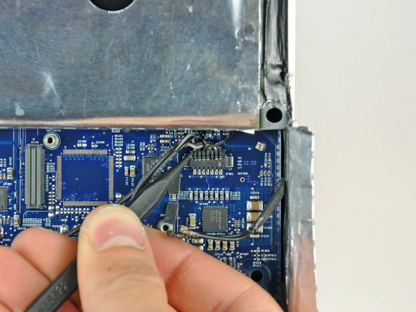 iMac G5 20" Model A1145 Speakers Replacement: step 20, image 2 of 2