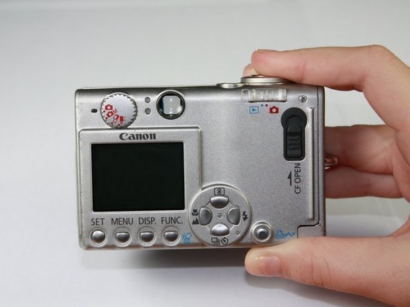 Canon Powershot S410 Memory Card Replacement: step 4, image 1 of 2