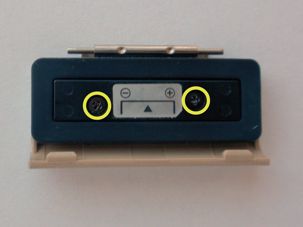 Olympus Stylus 410 Battery Cover Replacement: step 13, image 1 of 3