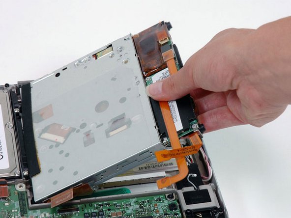 PowerBook G4 Titanium DVI PRAM Battery Replacement: step 5, image 1 of 1