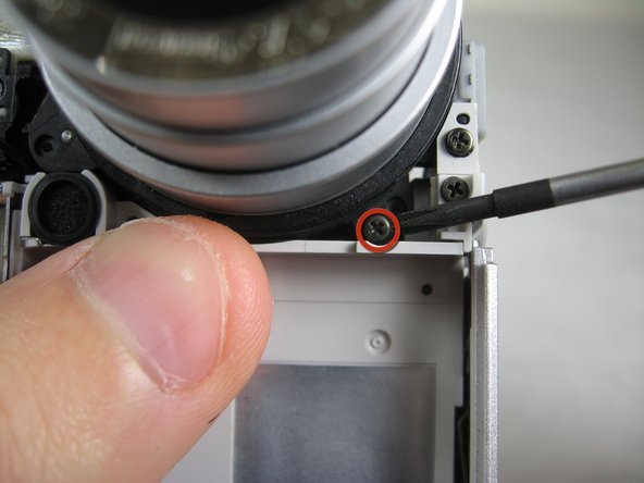 Disassembling Pentax Optio S4i Lens Assembly: step 26, image 2 of 3