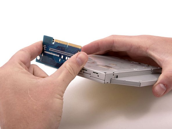 Mac mini (PowerPC) Optical Drive Replacement: step 15, image 1 of 1