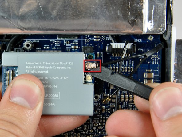 iMac G5 17" Model A1144 AirPort/Bluetooth Board Replacement: step 13, image 2 of 2