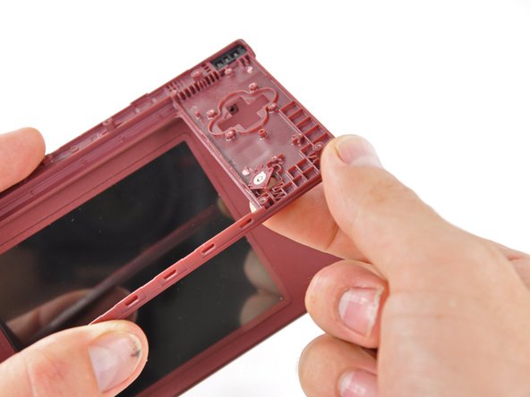Nintendo DSi XL Front Bezel Replacement: step 36, image 2 of 2