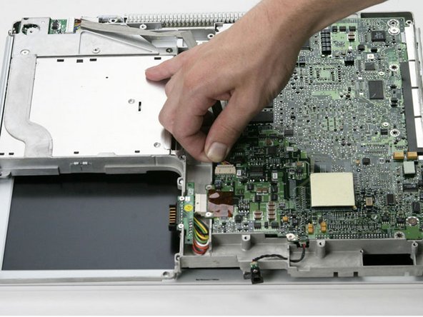 iBook G3 14" DC-In Board Replacement: step 31, image 1 of 1