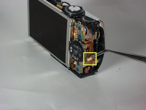 Disassembling Canon Powershot SD880 Menu Button: step 2, image 3 of 3