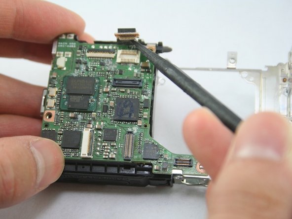 Disassembling Canon PowerShot SD1100 IS AV port and Logic board: step 24, image 2 of 2