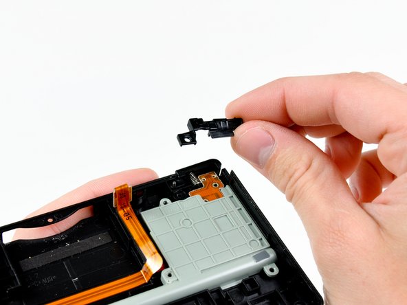 Nintendo DSi Trigger Button/SD Board Assembly: step 9, image 1 of 2