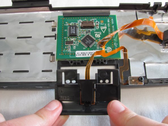 PowerBook 3400 M3553 Track Pad Replacement: step 12, image 1 of 1