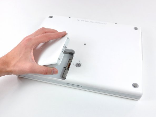 iBook G4 14" 1.42 GHz Optical Drive Replacement, iBook G4 14" 1.42 GHz Optical Drive Replacement: step 1, image 2 of 2
