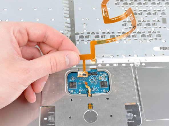 MacBook Core Duo Upper Case Cable Replacement: step 21, image 1 of 1