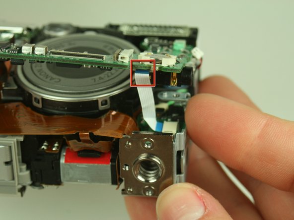 Canon PowerShot S400 Battery Replacement: step 15, image 2 of 3