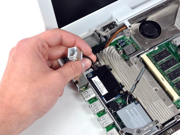 iBook G4 14" 1.42 GHz RJ-11 Board Replacement: step 33, image 1 of 1