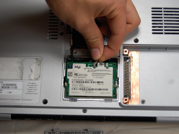 HP Pavilion dv1000 Back Cover Replacement: step 15, image 2 of 3