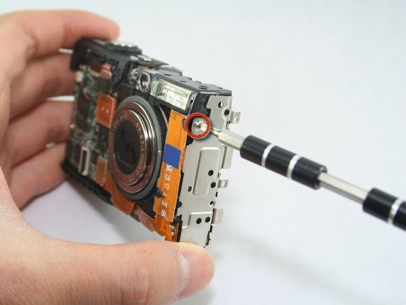 Disassembling Canon PowerShot SD1100 IS AV port and Logic board: step 11, image 1 of 1