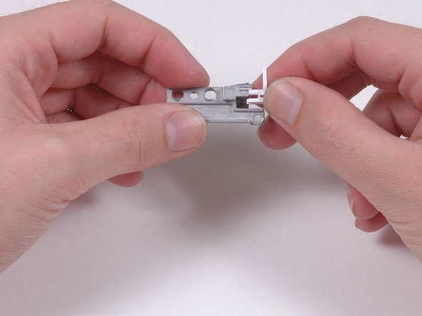 MacBook Core 2 Duo Left Hinge Mount Replacement: step 14, image 1 of 1