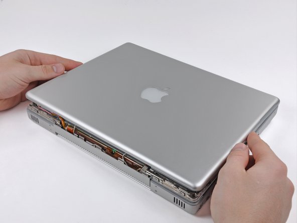 PowerBook G4 Aluminum 12" 867 MHz Rear Display Bezel Replacement: step 6, image 1 of 3