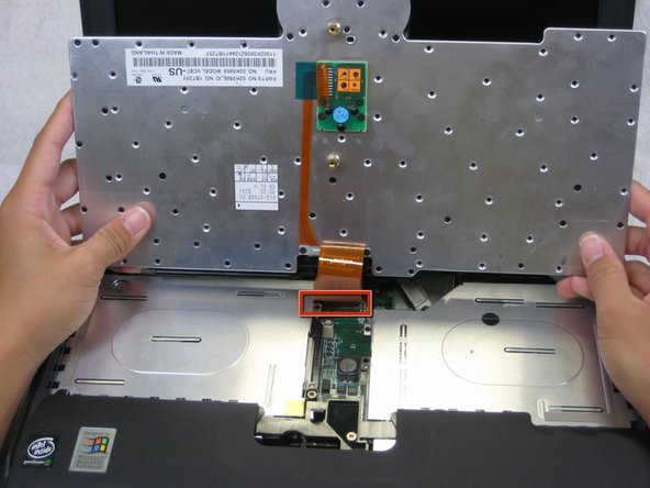 Disassembling IBM ThinkPad A30 Upper Case: step 7, image 1 of 3