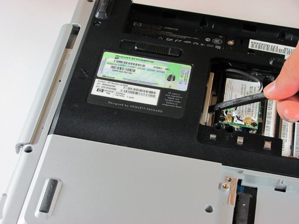 HP Pavilion dv5000 Optical Drive Replacement: step 4, image 1 of 3