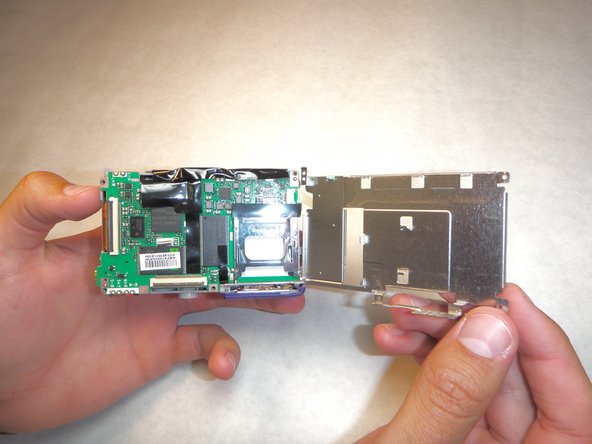 Sanyo VPC S1275 Logic Board Replacement: step 9, image 1 of 1